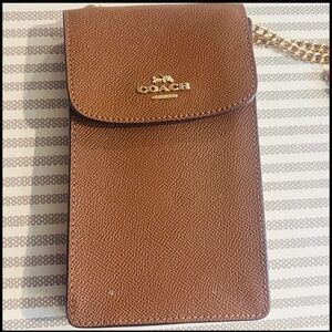 Coach brown cellphone crossbody bag with chain strap. In very good condition